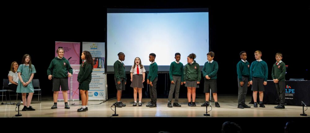 Pupils performing their chosen poem at the CLiPPA award ceremony at the National Theatre
